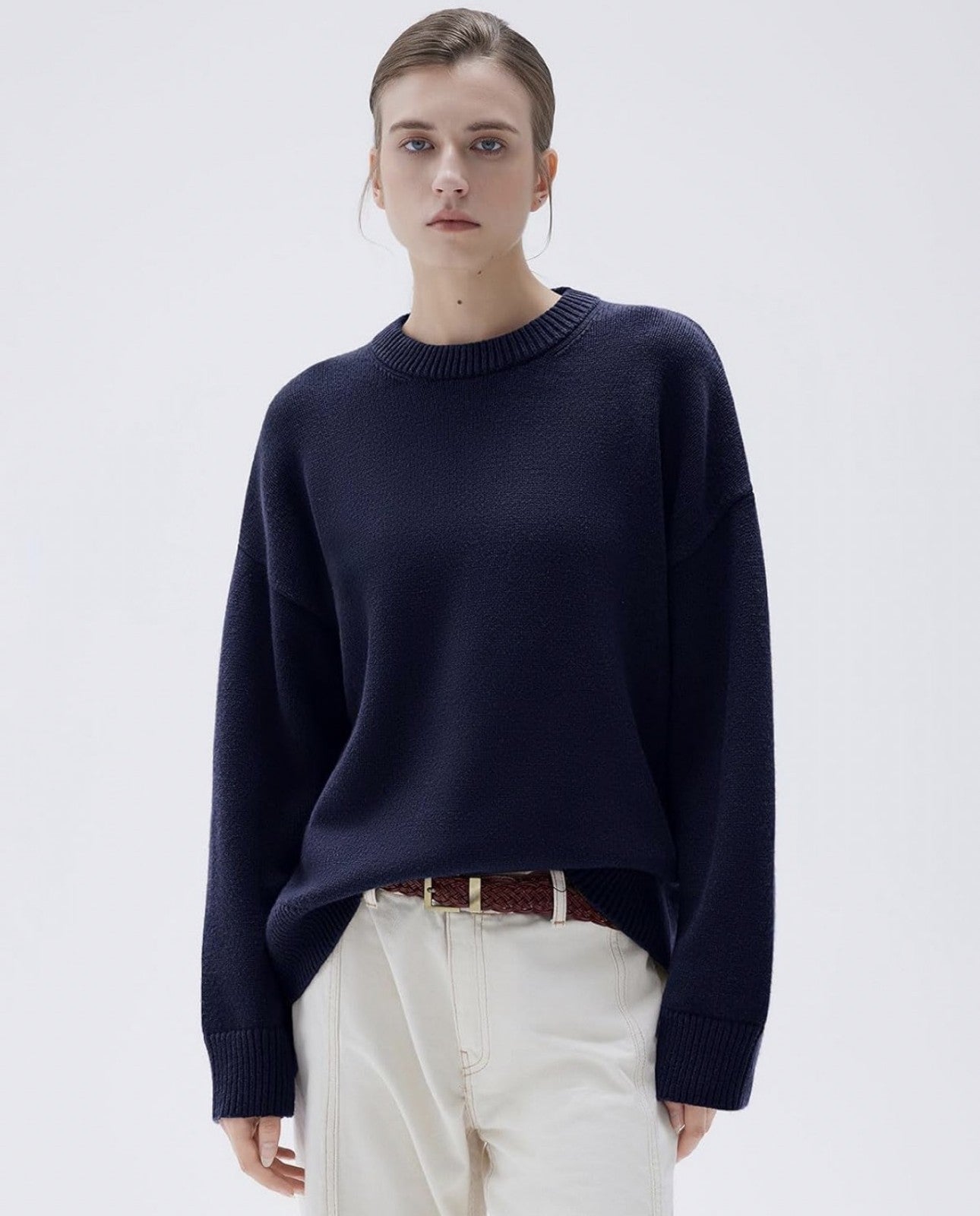 Navy blue cashmere sweater on model, front view