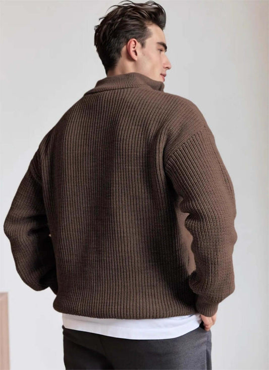 Back view of coffee half zip sweater on male model