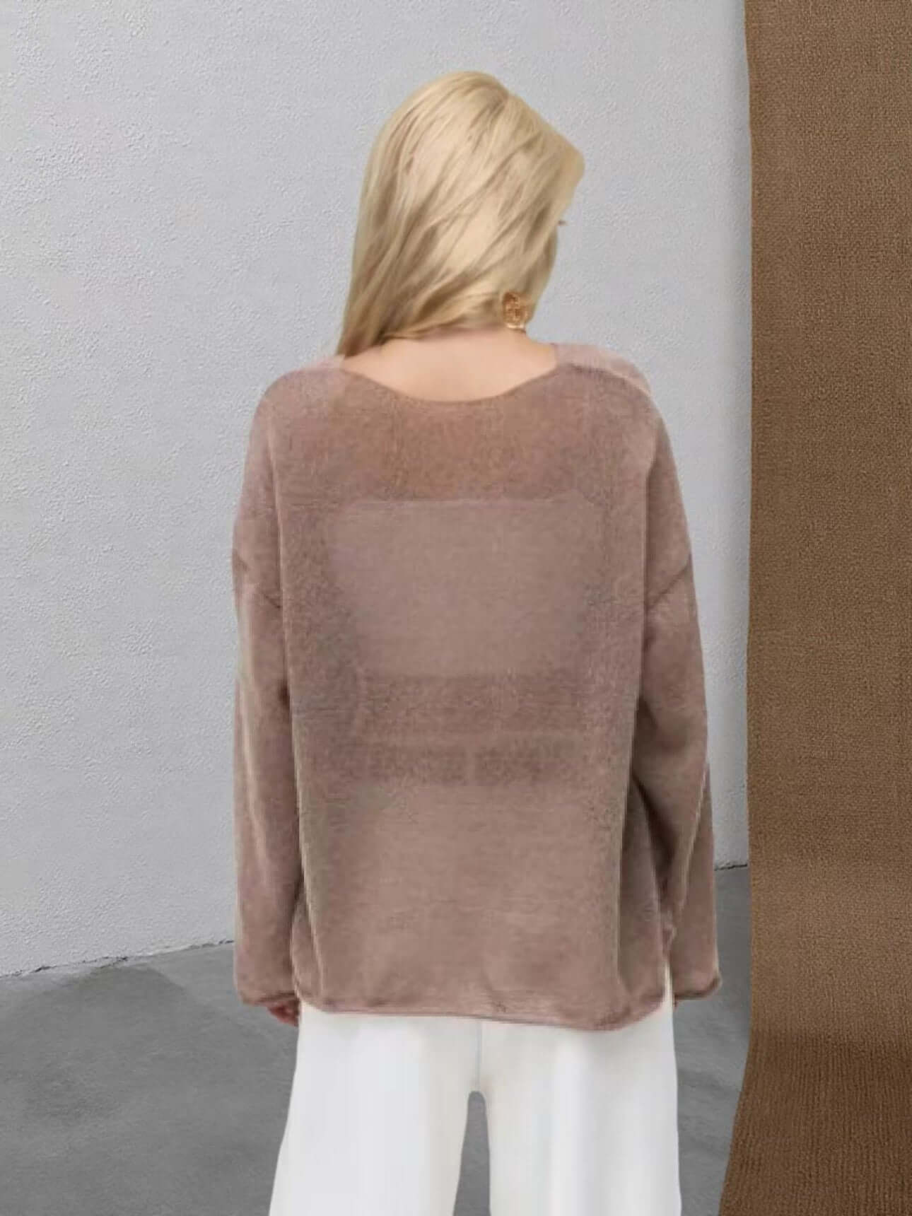 Back view of Women's Sheer Sweater with round neck and bell sleeves in light brown color.