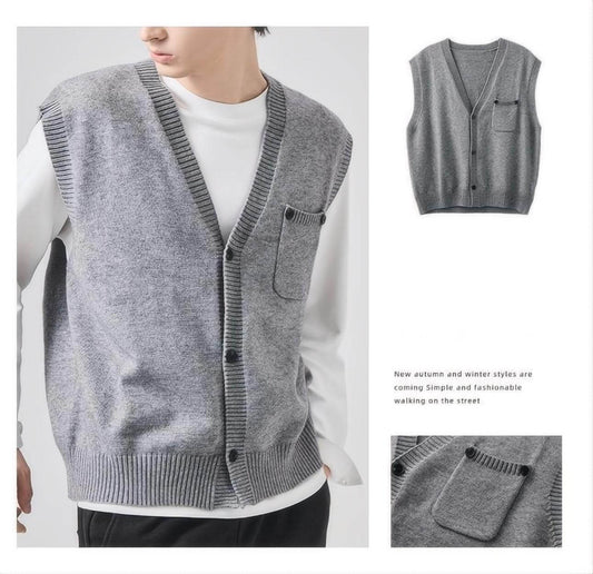 Side profile view of model in gray sleeveless sweater.