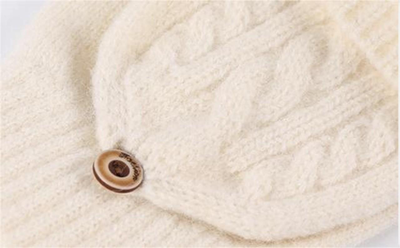 Close-up of Flip Cap Fingerless Gloves OEM showcasing cable knit pattern and decorative button.