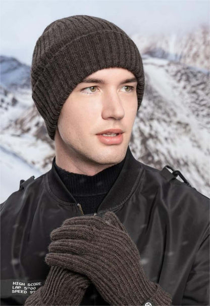 Men wearing cold proof hat and gloves set against a snowy background, showcasing winter knitwear style.