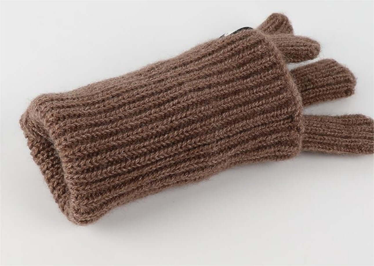 Cold proof hat and gloves set featuring a brown knitted glove with finger openings for warmth and comfort.
