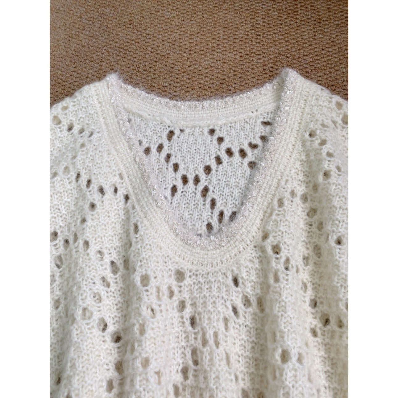 Crochet lace knit dress manufacturer close-up sparkling trim front neckline