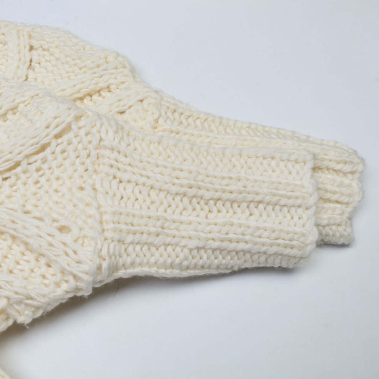 Hand crochet openwork sweater manufacturer close-up of openwork texture on sleeve cuff