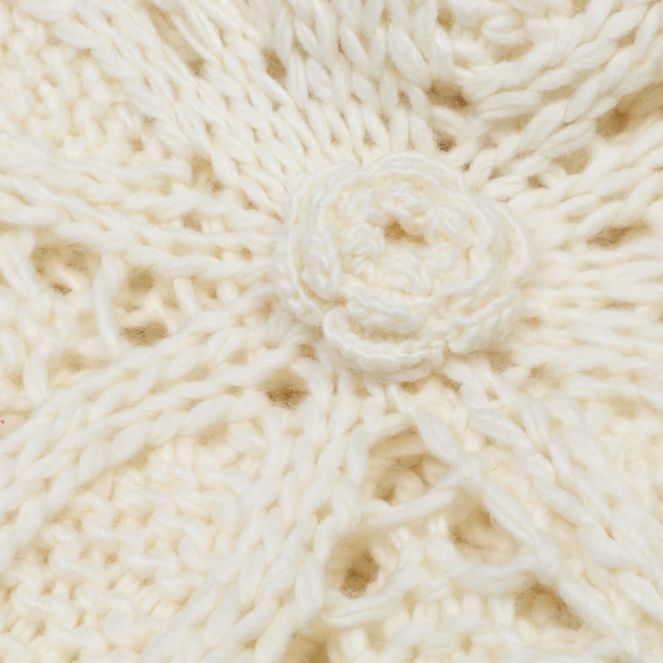 Hand crochet openwork sweater manufacturer close-up of large floral crochet design
