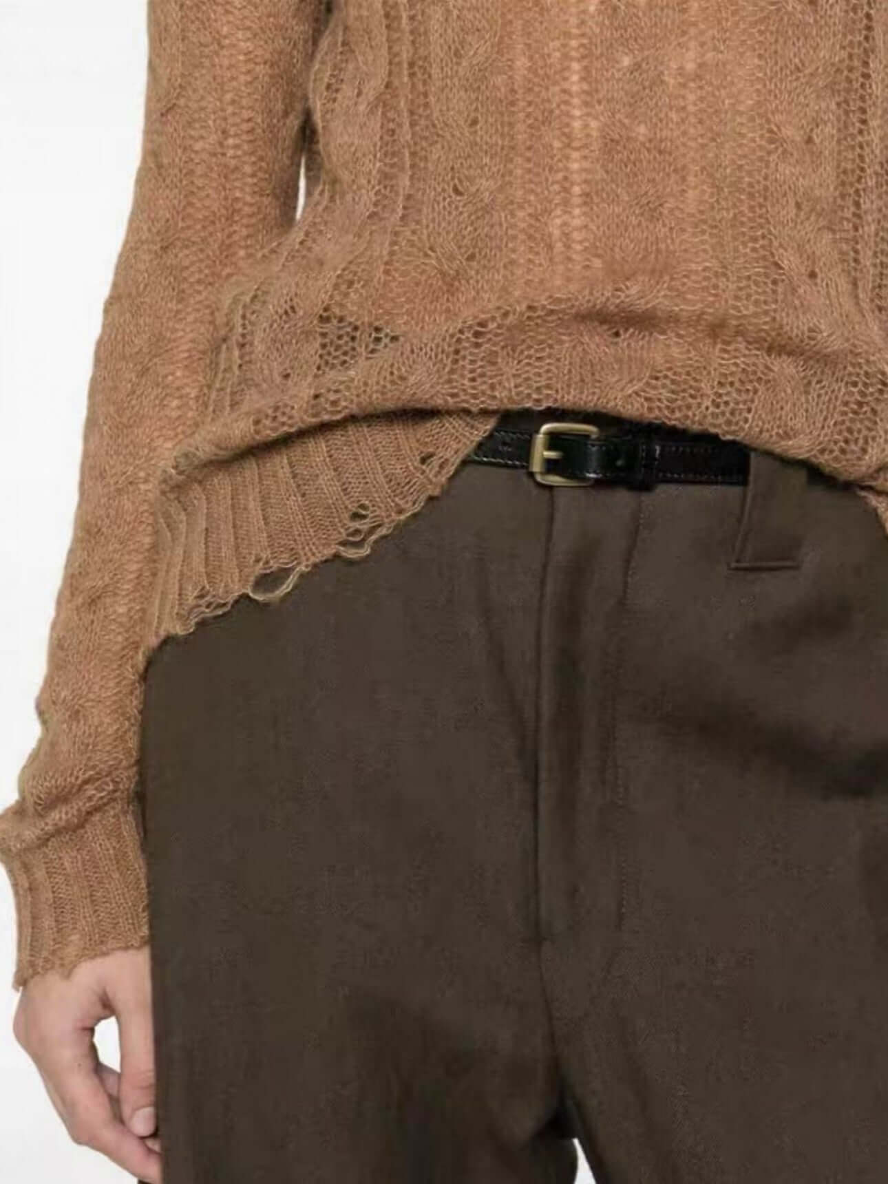 Sheer cashmere sweater manufacturer close-up of fine hem finishing on delicate sheer knit