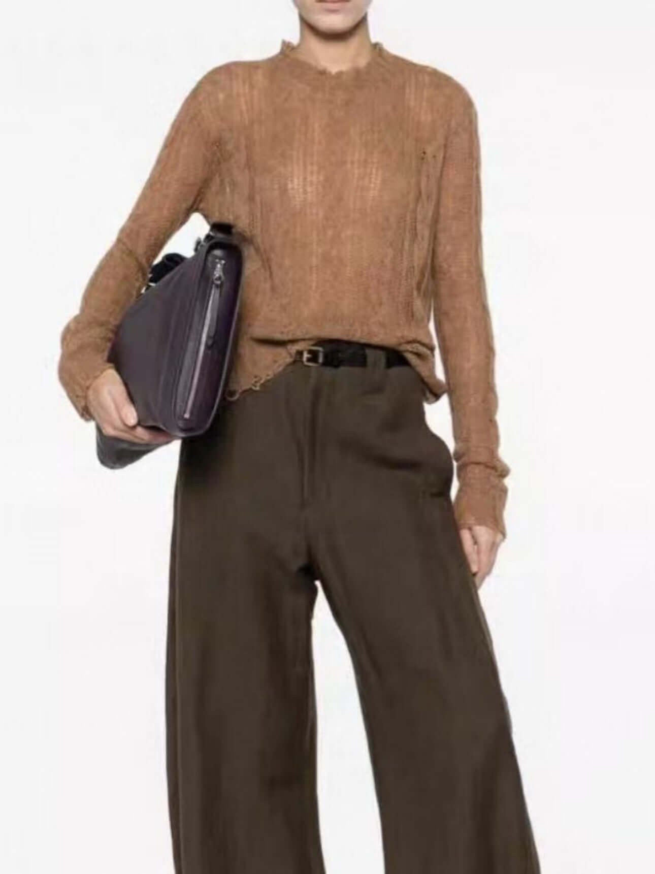 Sheer cashmere sweater manufacturer side view displaying fit and silhouette of long sleeve sheer sweater