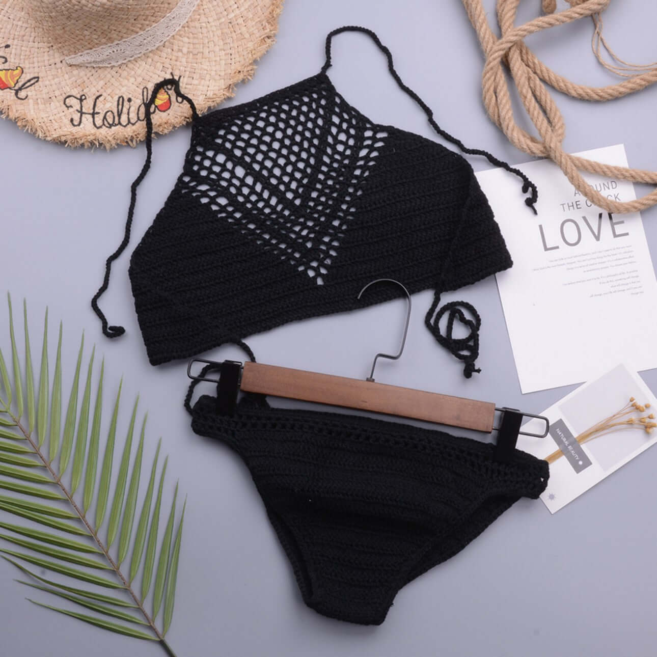 Black hand crochet bikini set flat lay manufacturer