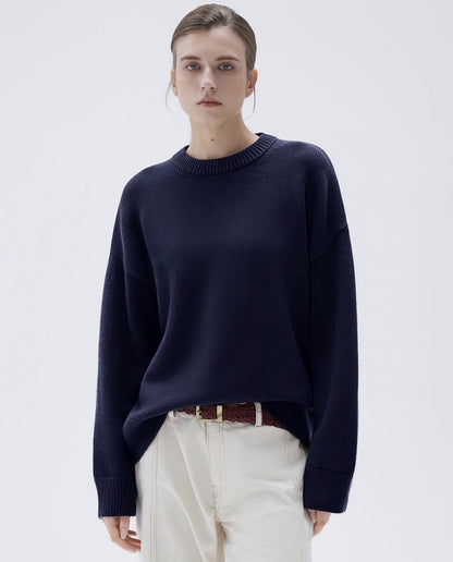 Navy blue cashmere sweater on model, front view