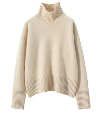 Flat lay detail of apricot high neck sweater