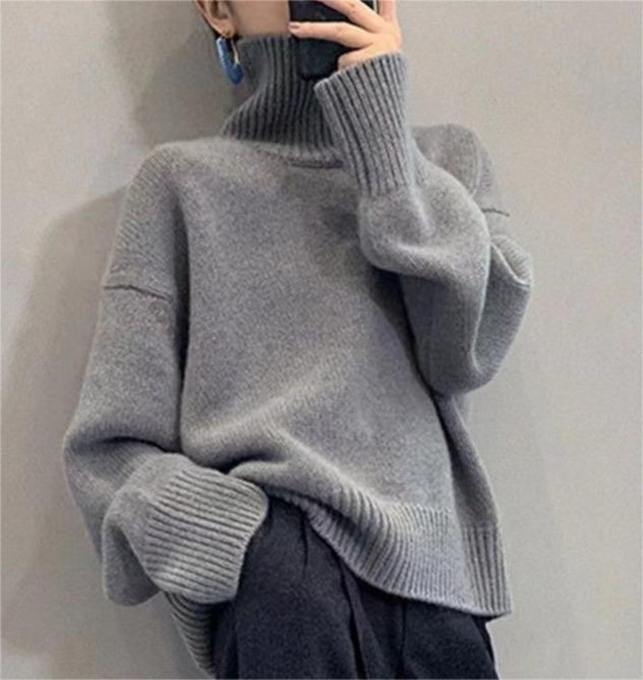 Gray high neck sweater, front view on woman