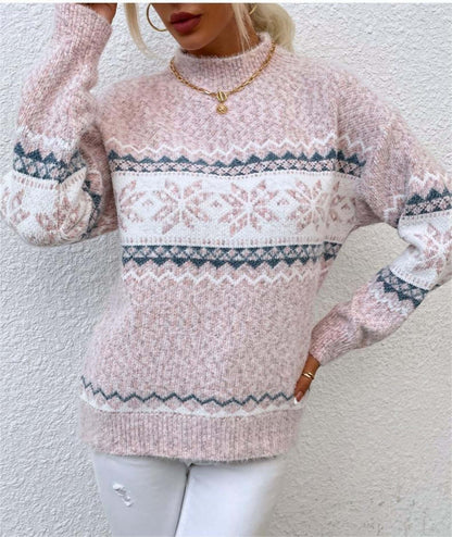 Women in pink Jacquard Pattern Sweater, featuring intricate snowflake patterns and a mid neck design for the holiday season.