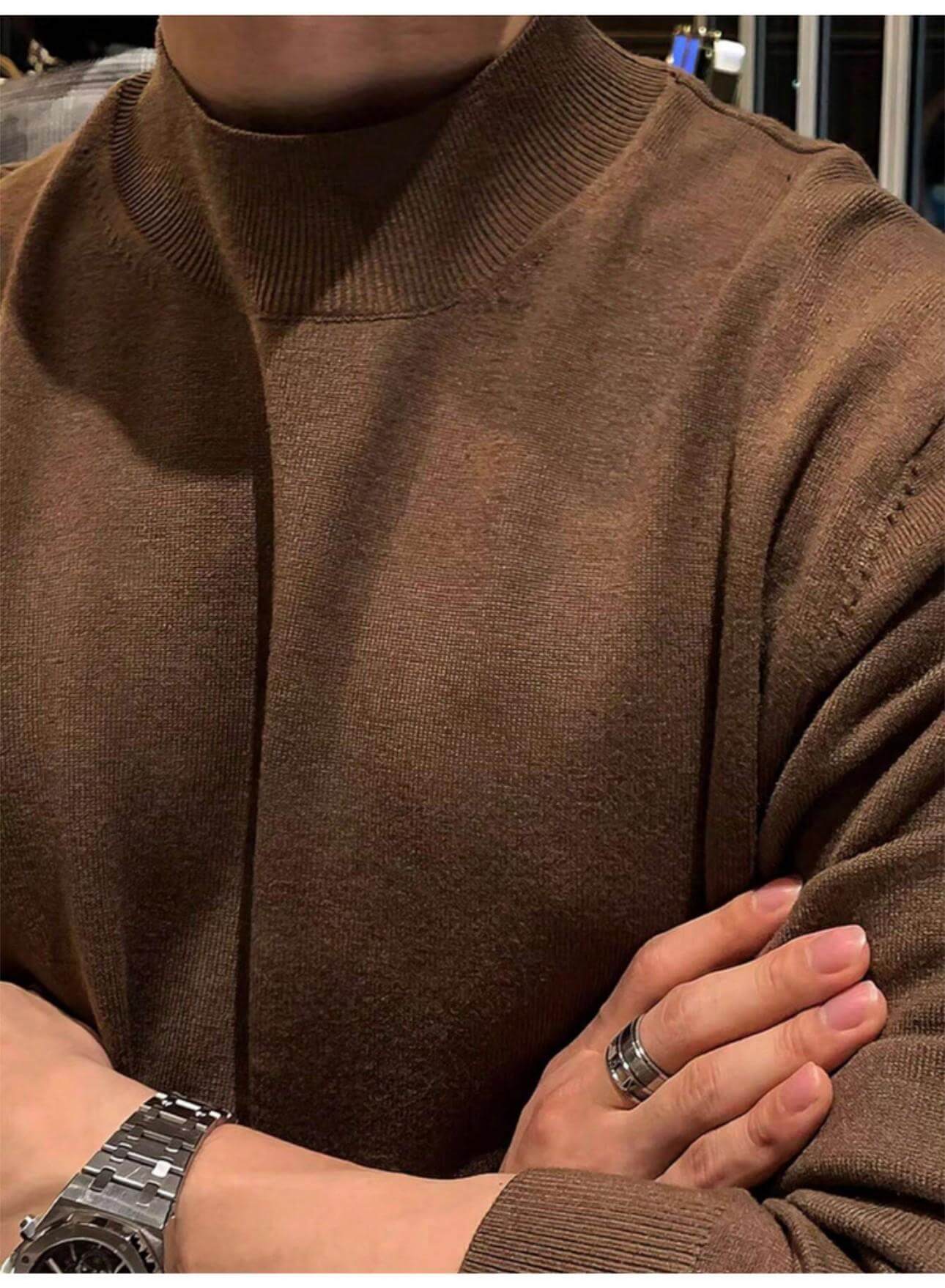 Close-up detail of men's coffee half turtleneck knitted sweater collar