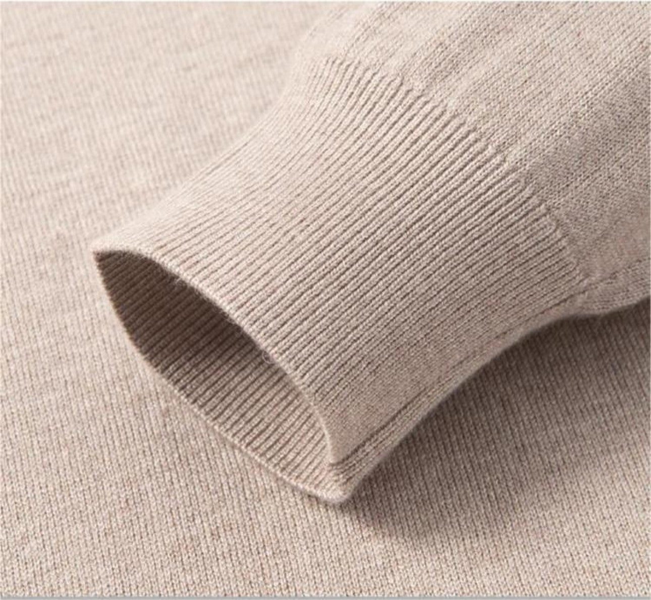 Ribbed cuff detail of polo wool sweater