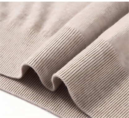 Hem finishing detail of polo wool sweater