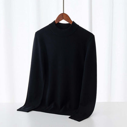 Men's Wool Sweater OEM - Thick round-neck black sweater hanging on display.