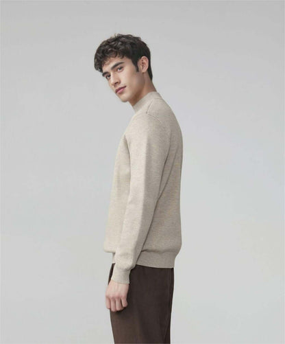 Men's Wool Sweater OEM - Model wearing a beige thick round-neck wool sweater, showcasing timeless style and comfort.