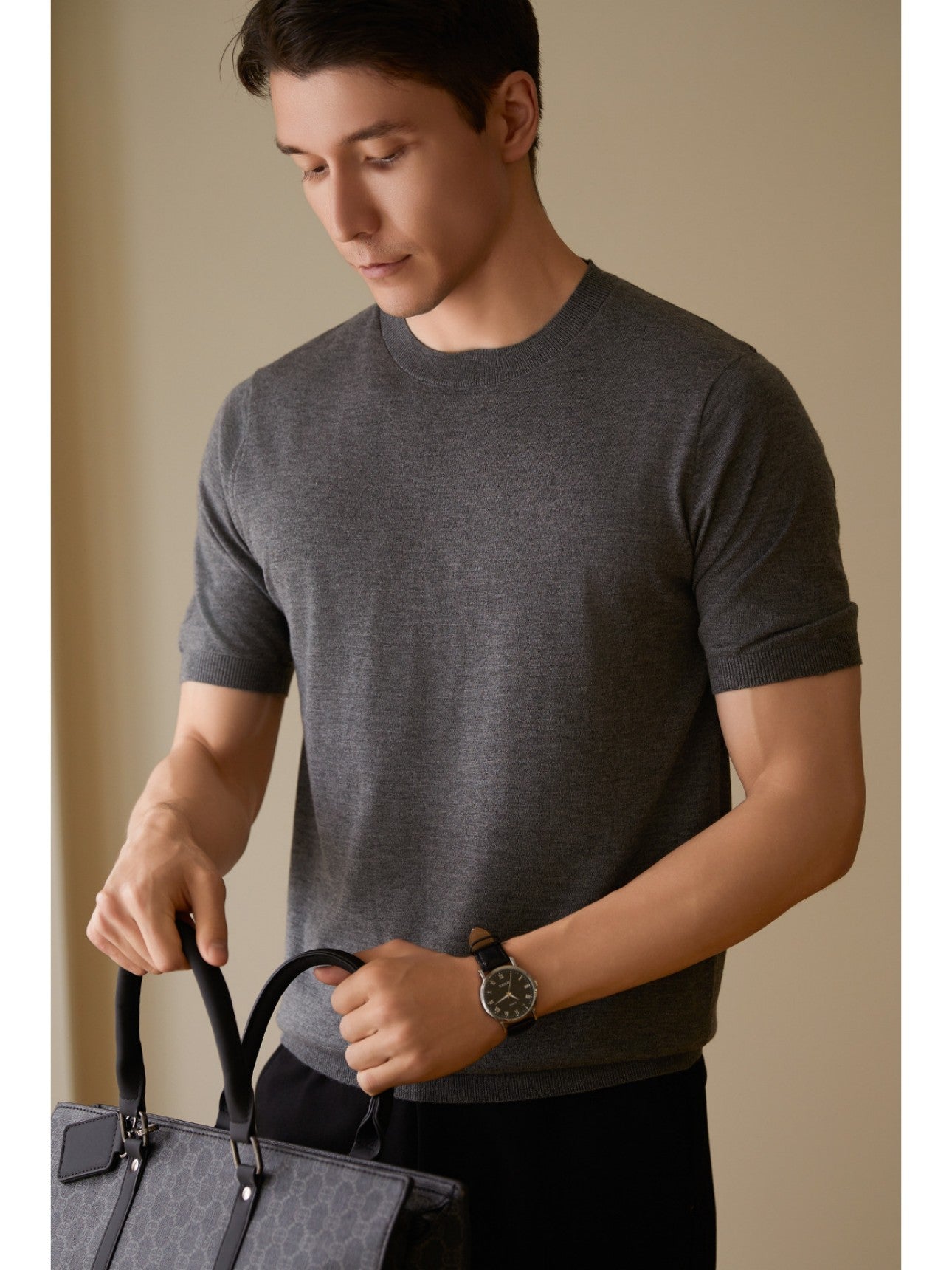 Men's gray short-sleeved sweater front view on model