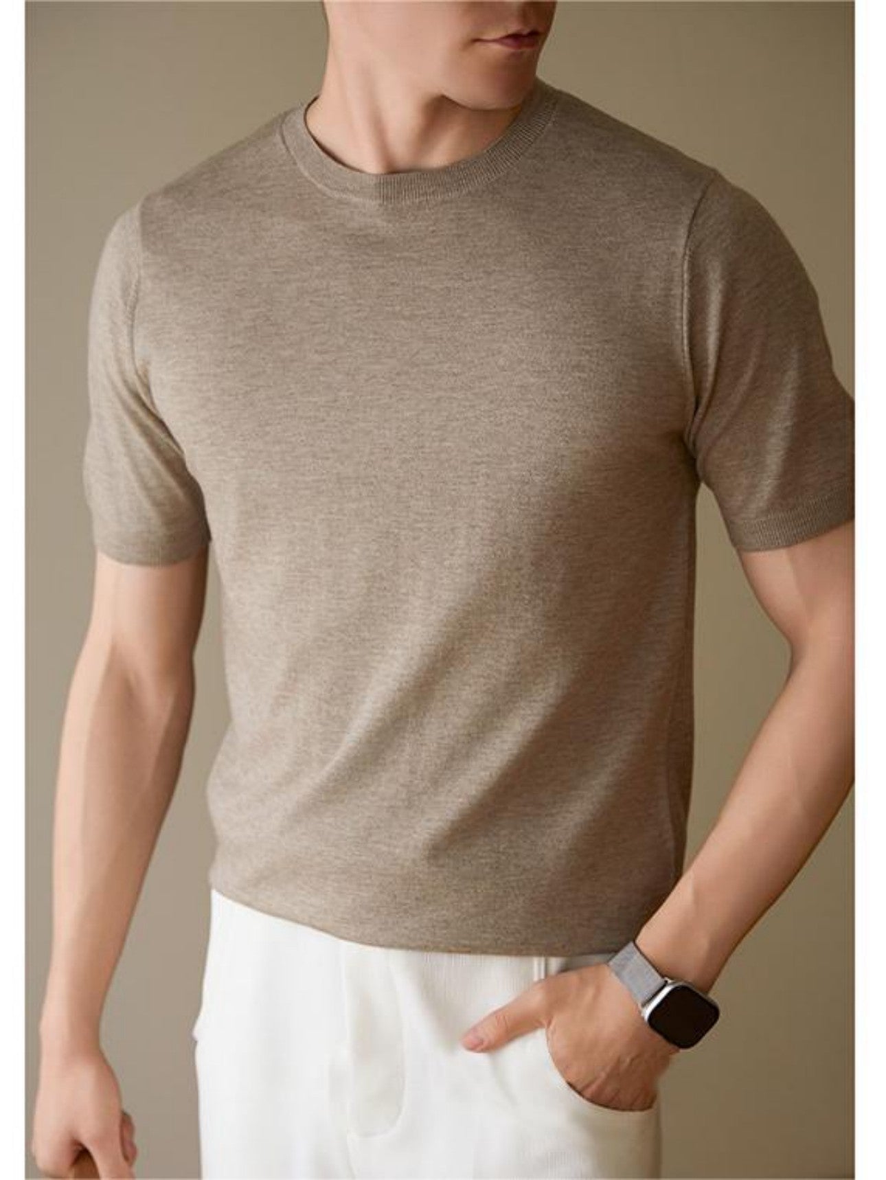 Men's oatmeal short-sleeved sweater front view on model