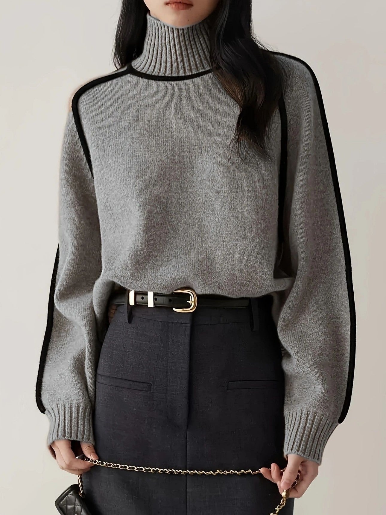 Gray new sweater, front view on female model
