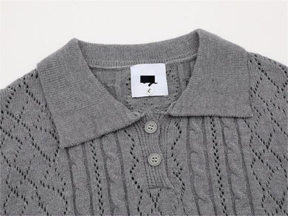 Close-up detail of polo collar on gray sweater
