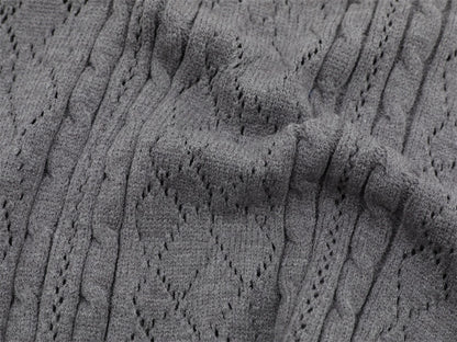 Fabric texture close-up of gray polo collar sweater