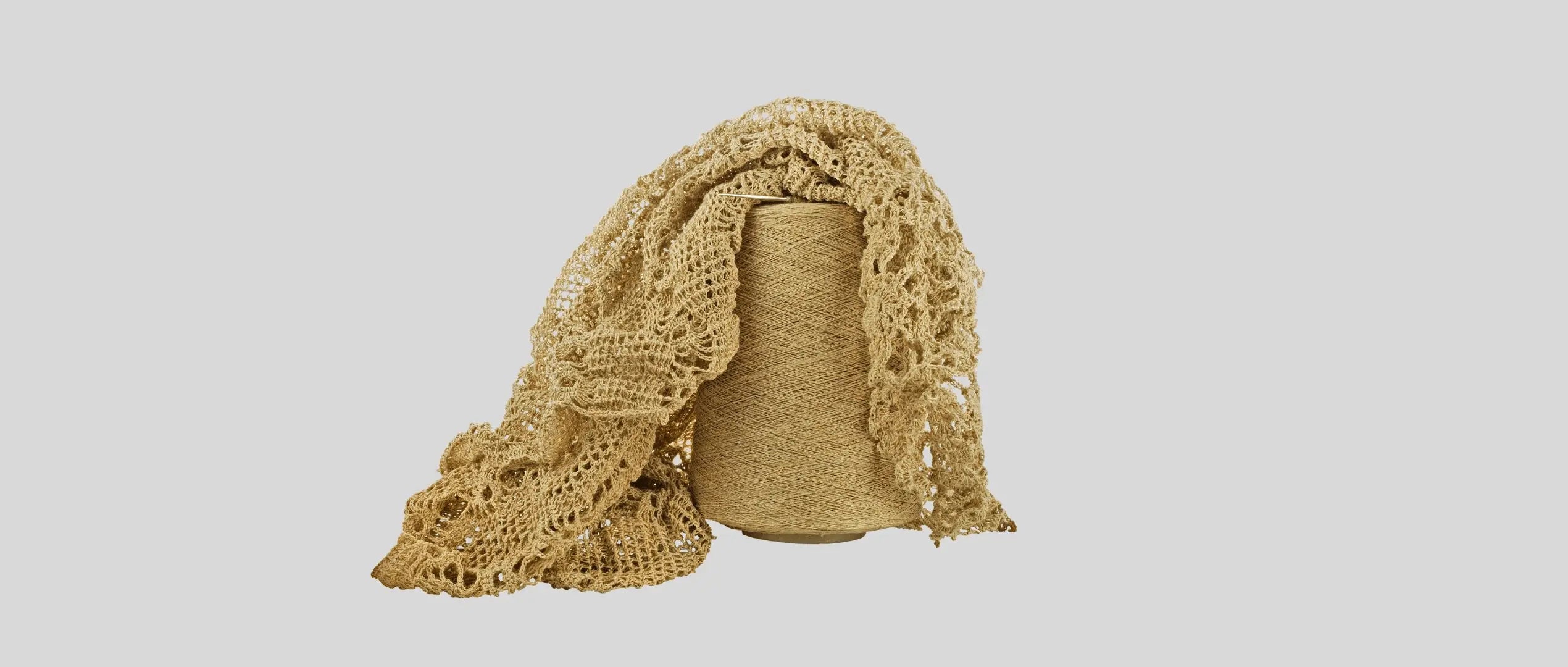 High-quality knitting yarn and knit fabric swatch, showcasing our control over premium raw materials for wholesale.