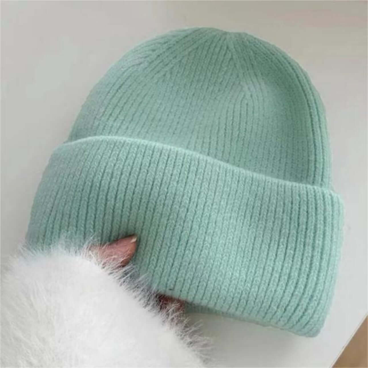 Warm Hat OEM - Women's Rabbit Hair Beanie in soft mint color with folded brim, ideal for winter fashion.