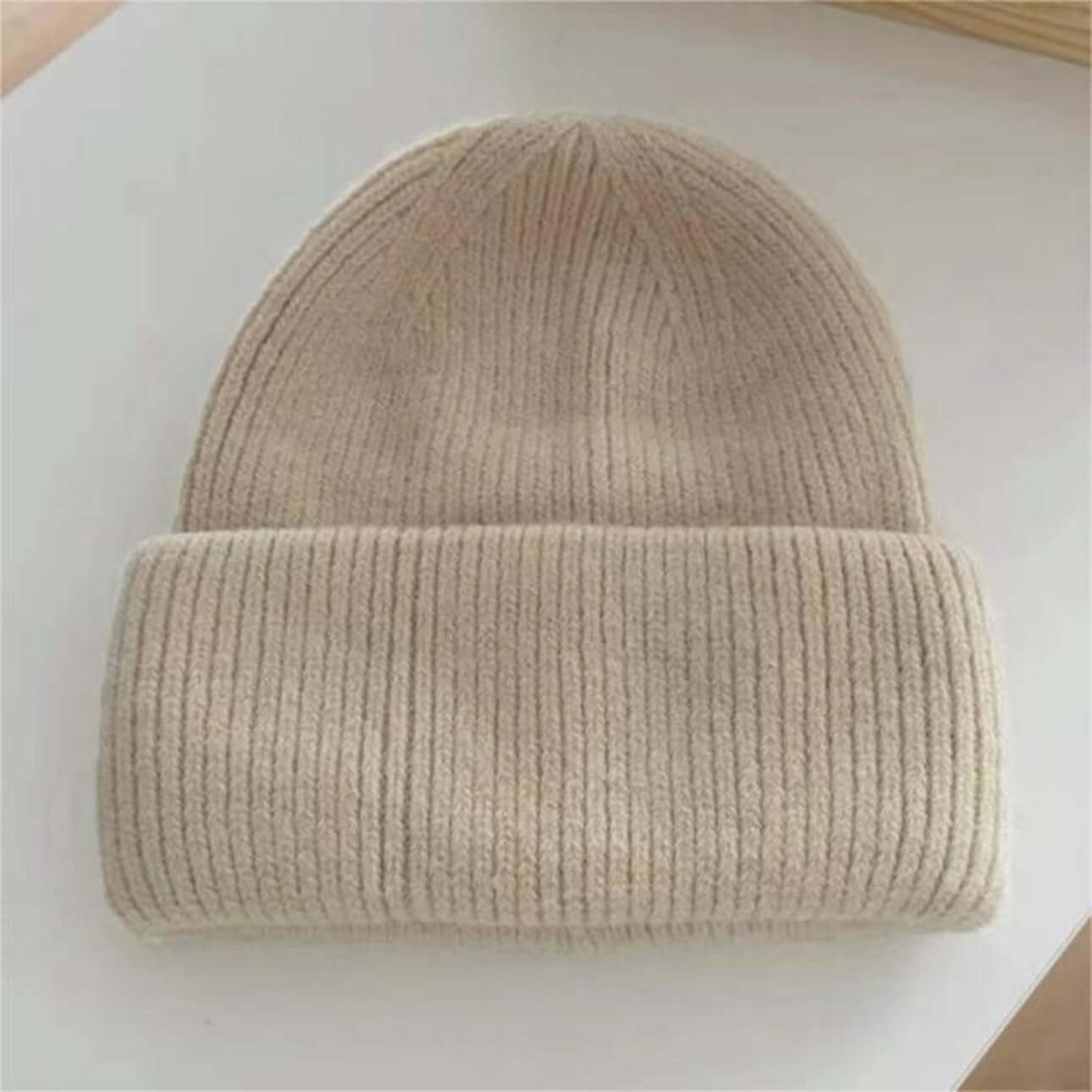 Warm Hat OEM | Women's Rabbit Hair Beanie with Folded Brim in soft beige color on a white surface.