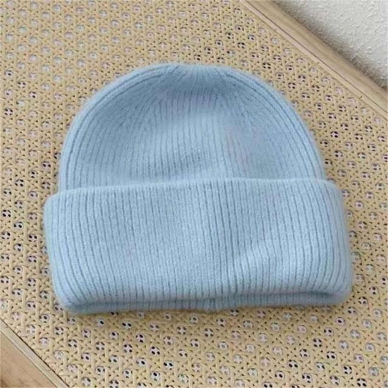 Warm Hat OEM: Women's Rabbit Hair Beanie in light blue with folded brim, perfect for winter fashion.