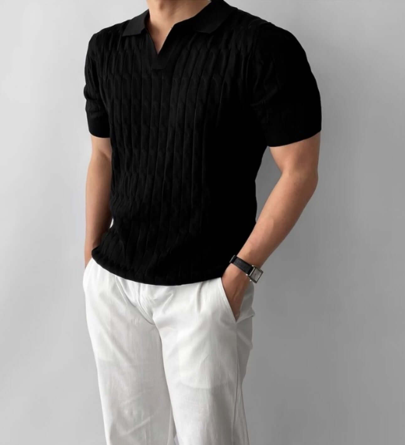Short sleeve lapel sweater OEM in black worn by a man with a watch, showcasing a stylish V-collar design.