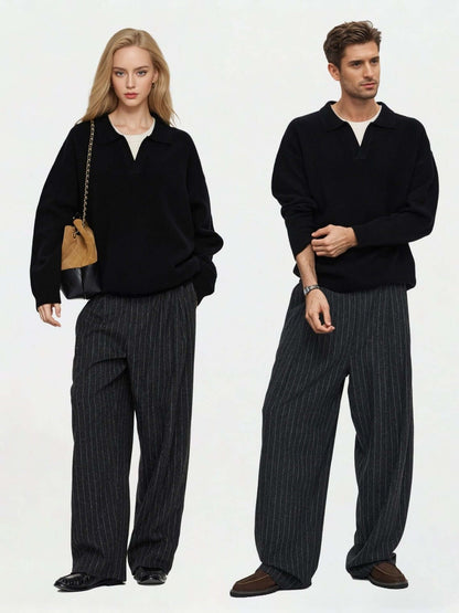 Unisex Cashmere Sweater OEM modeled by male and female in stylish black outfits.