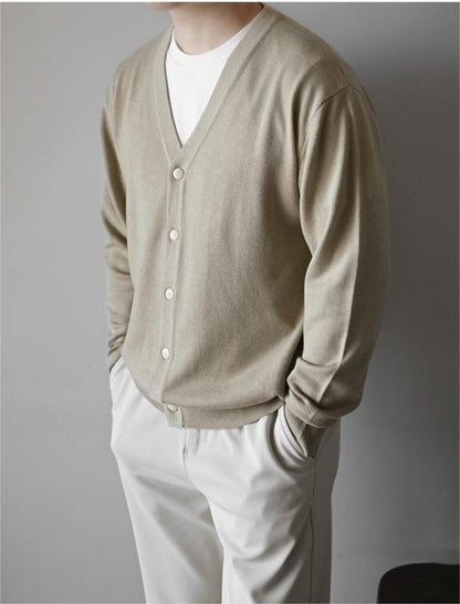 Men's V-neck wool cardigan in apricot, front view with all buttons fastened